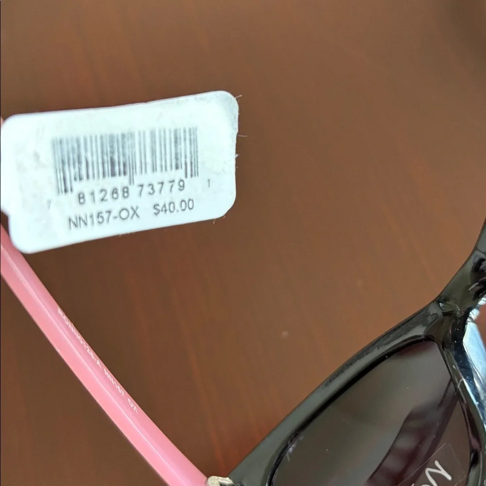 Nanette Lepore 100% UV protection,pearl pink arms,black round/square frame,NN157